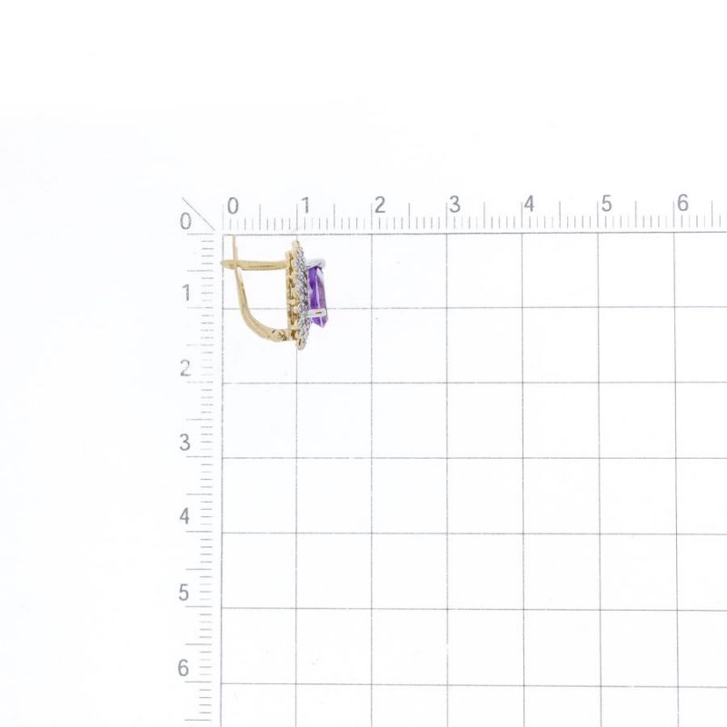 Фото как пример - золотые серьги с хризолитом в Германии - Фото №1