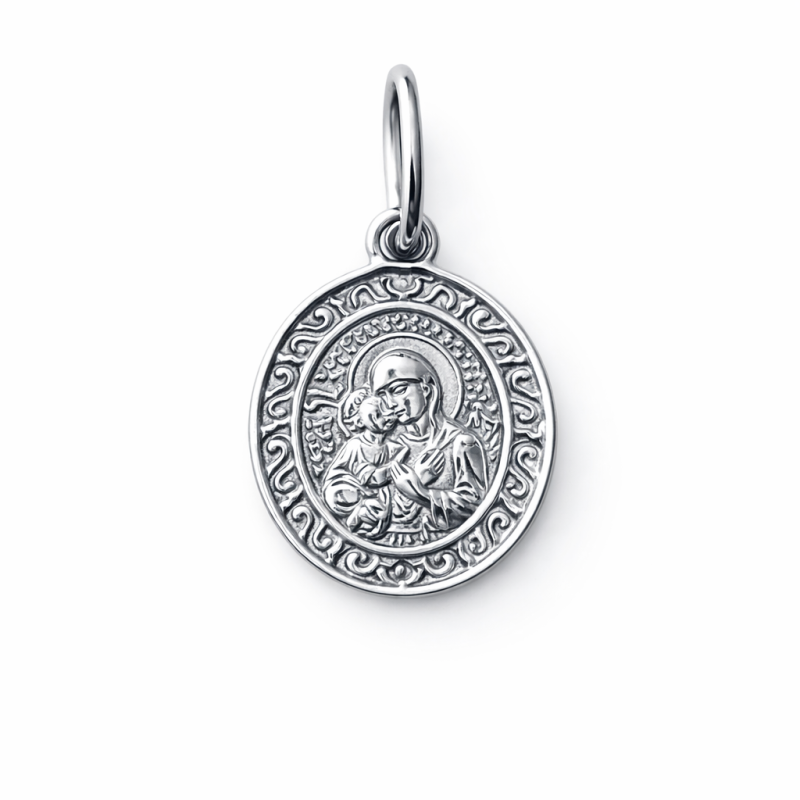 Иконка-подвеска Богородица с младенцем с молитвой на обратной стороне из серебра 925 пробы Иконка-подвеска Богородица с младенцем с молитвой на обратной стороне из серебра 925 пробы