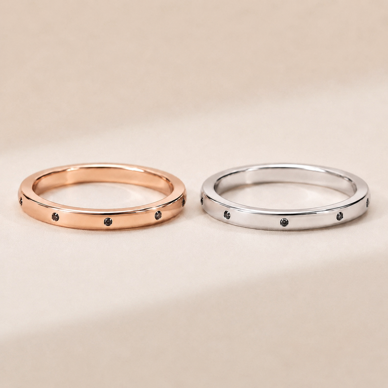 Anfertigung von Trauringen aus Weißgold und Rotgold 585 mit schwarzen Zirkonia